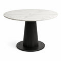 Table ronde Ø 110 × H 75 cm, plateau blanc effet marbre et pied central cannelé noir